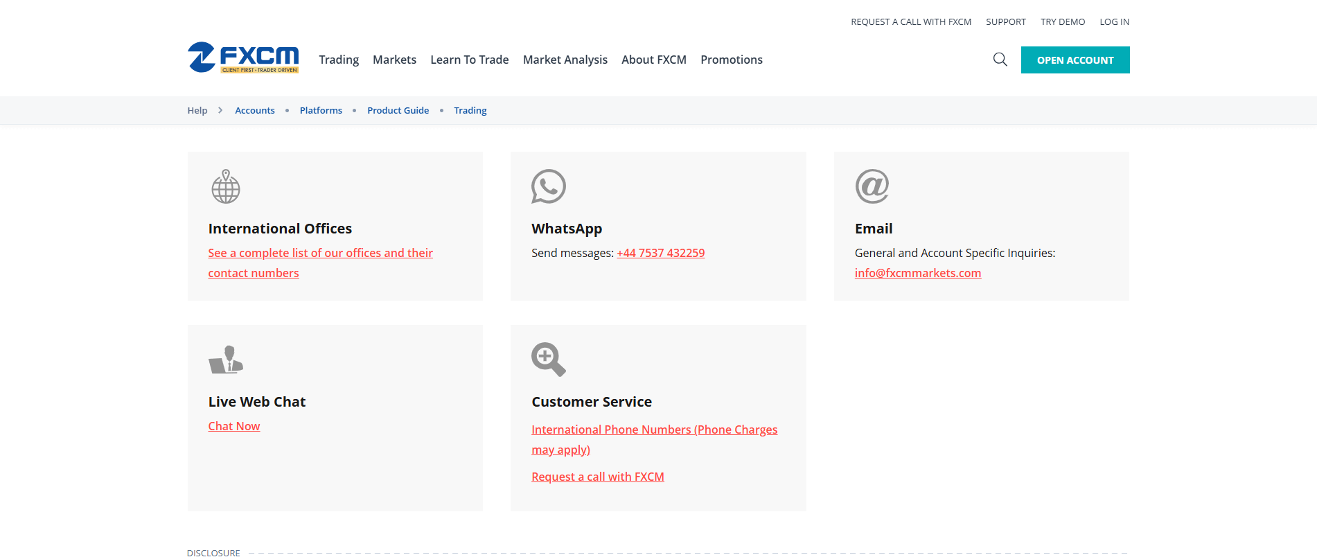 Screenshot of FXCM's official website displaying their contact information and customer support channels.